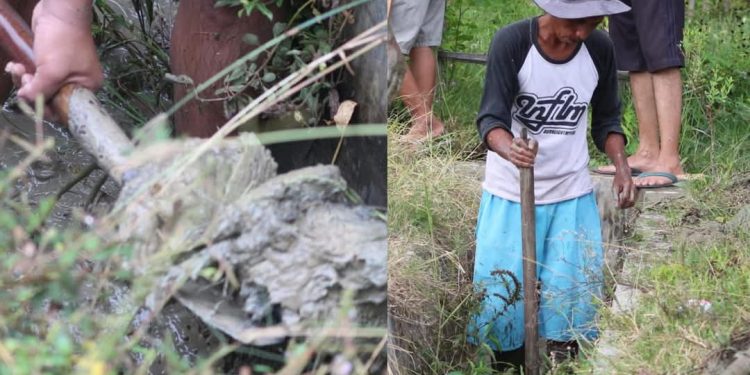 Karang Taruna Kecamatan Paguat Bersama Penambang Rakyat Pohuwato Bersihkan Lumpur Drainase 1 Kilometer
